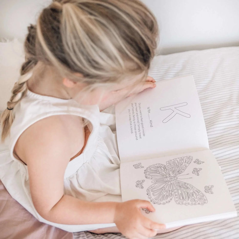 Girl reading mindfulness book
